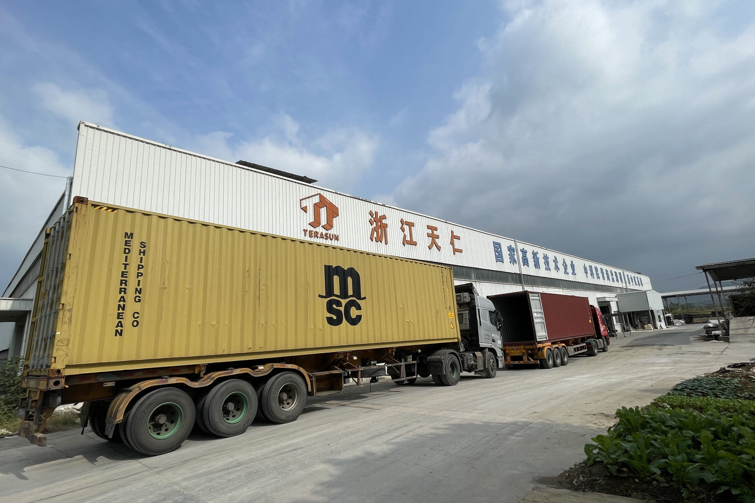 containers in front of the gate of terasun factory